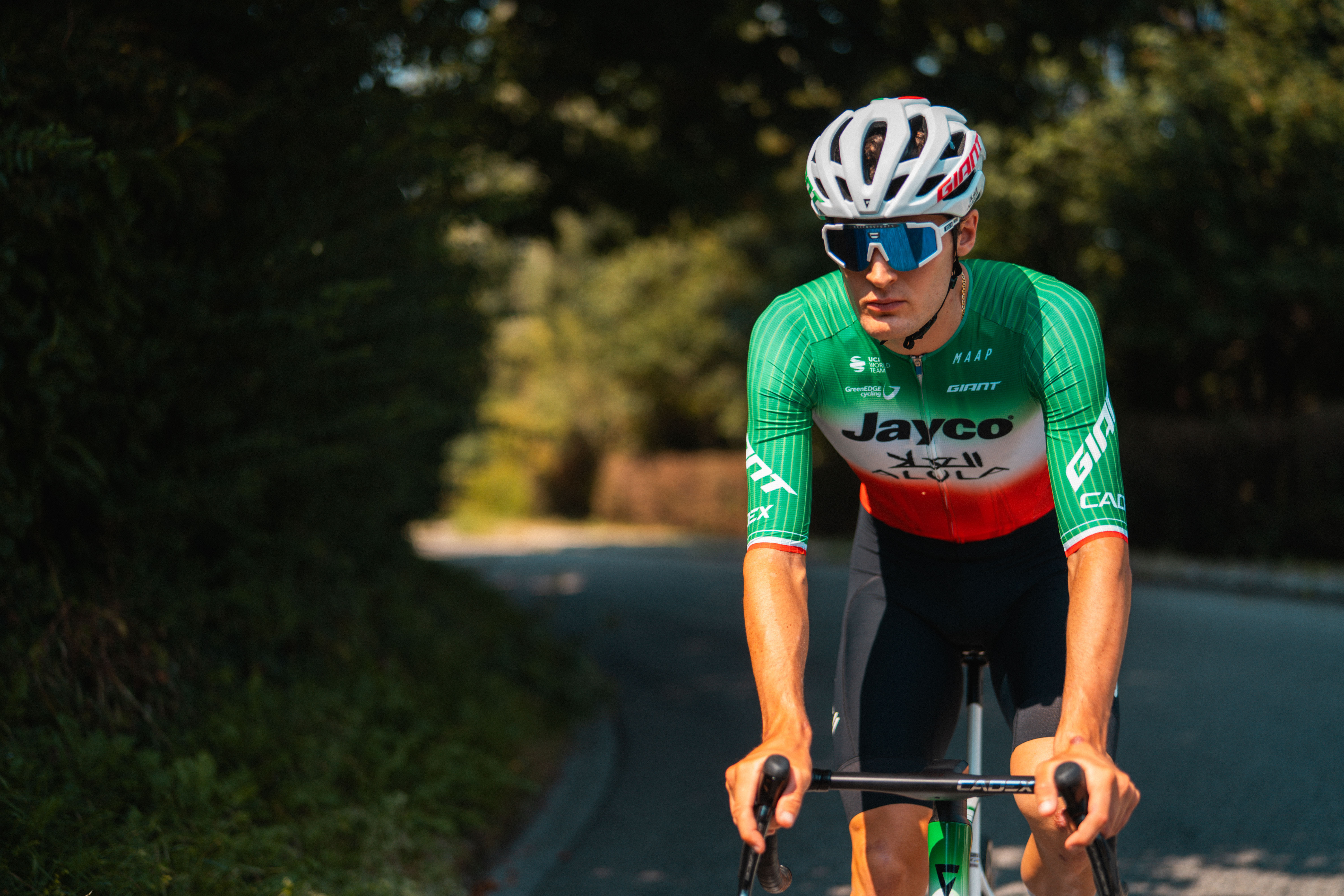 Filippo Conca rides his bike in the Italian champion's jersey